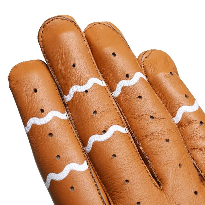 Translation missing: en.White frosting across each knuckles brown leather to depict a Gingerbread Man design