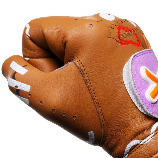 Fist closed showing the glove when stretched of the Gingerbread Man Golf Glove.