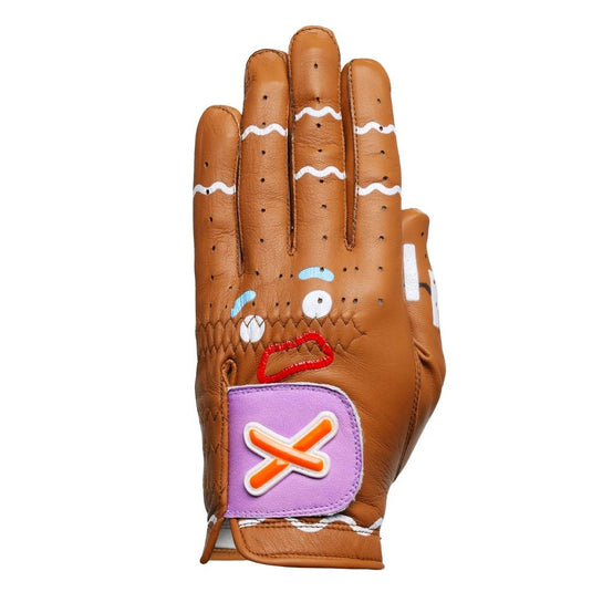 Gingerbread Man Golf Glove in brown with Gingy face in the form of frosting across the knuckles, frosting decor on fingers, and purple gum drop button style velcro strap with X logo across it.