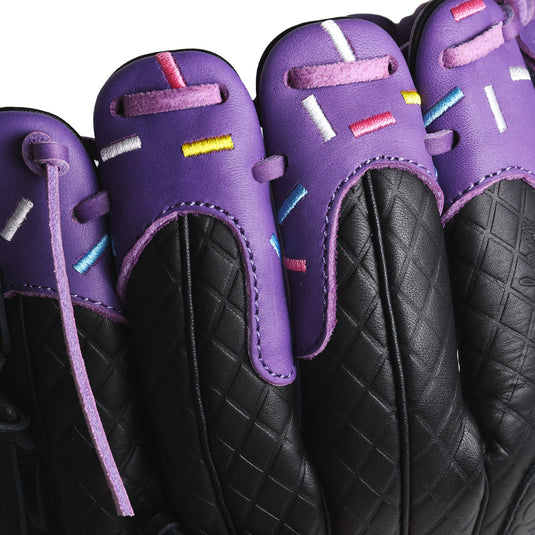 Close up detailed image of the purple drip and stitched sprinkles over the black waffle cone pattern