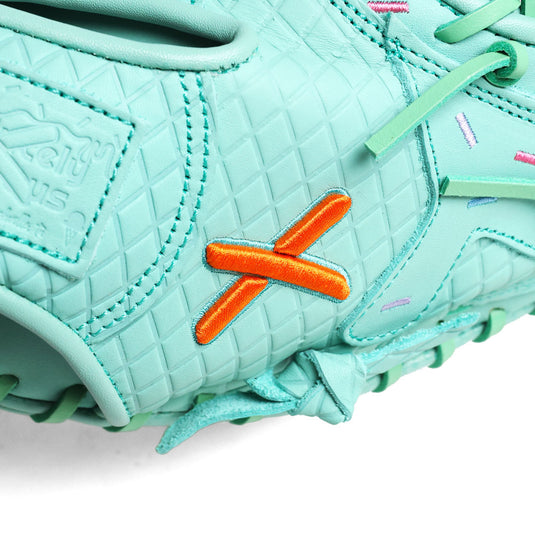 Close-up of the all mint youth catcher's mitt with an orange 'X' logo