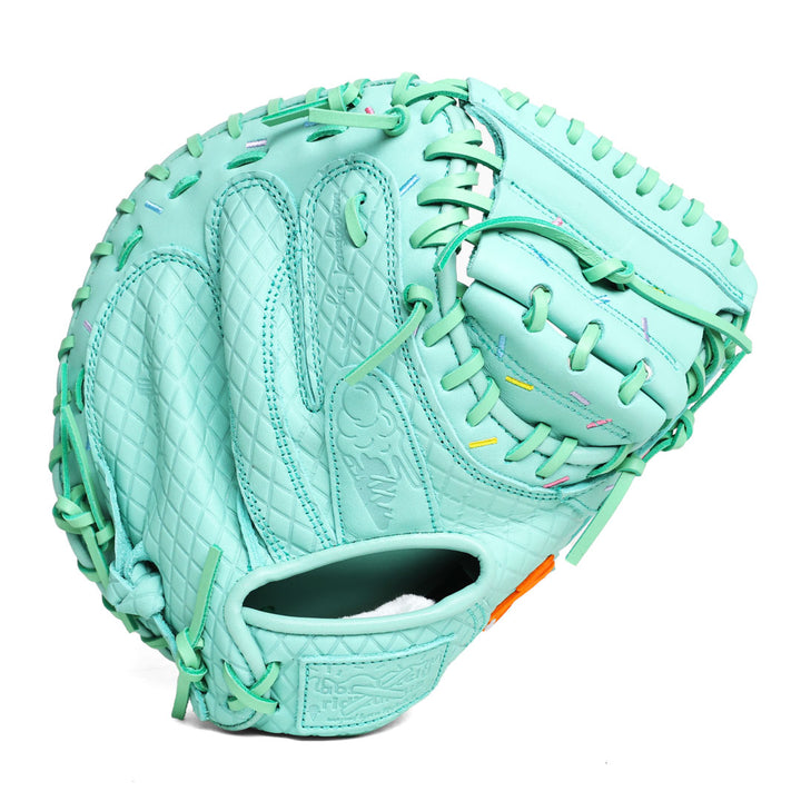 Mint youth baseball catchers mitt with stitched sprinkles across the drip pattern 