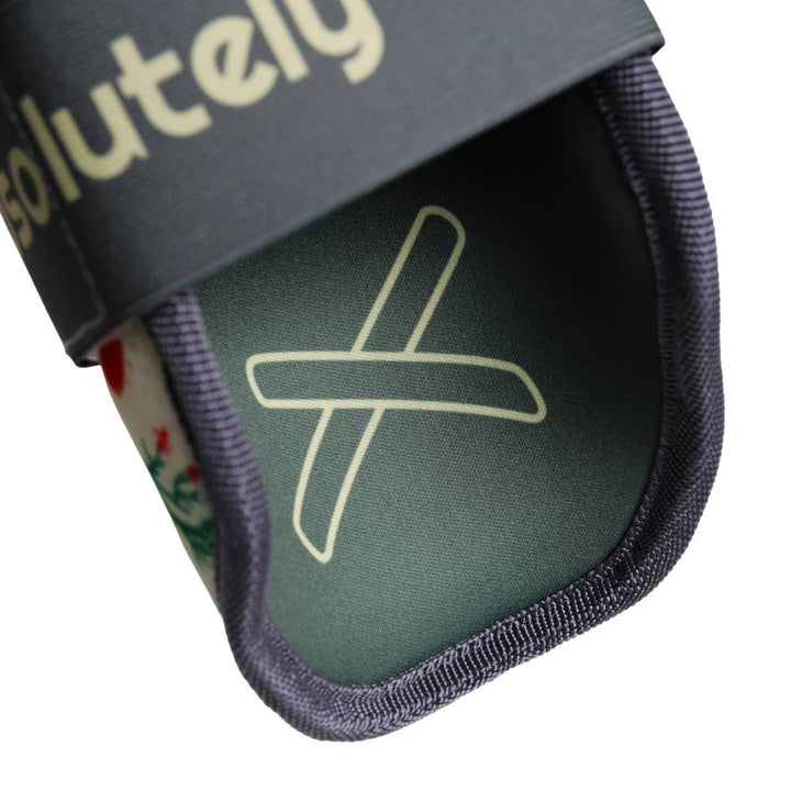 Translation missing: ja.“Bottom and behind view of the elbow mitt featuring dark green area with outlined X logo.”