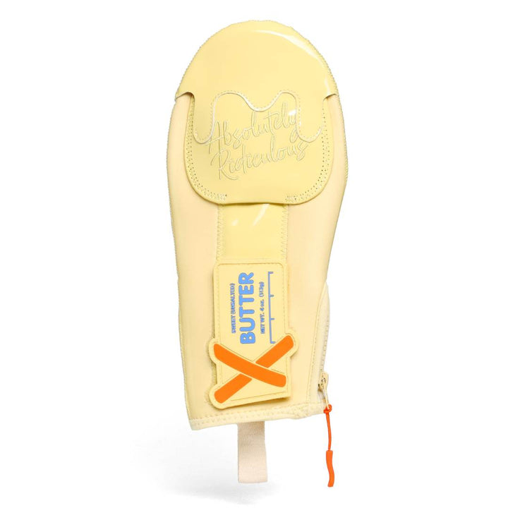 butter colored hybrid sliding mitt with patch and zipper, and no the strap in this outer shot of the sliding mitt