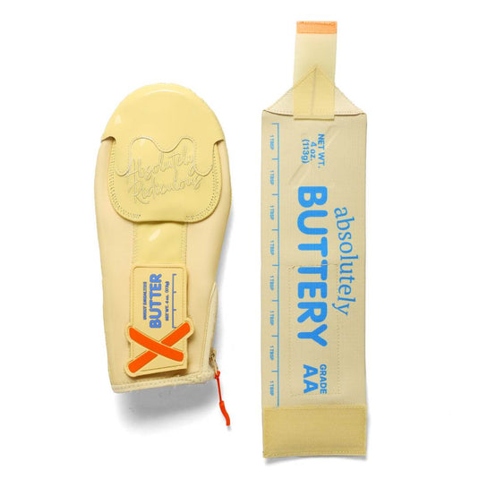 flat view of Butter Hybrid sliding mitt highlighting adjustable wrist strap with stick butter design 