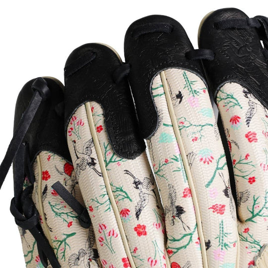 Close-up side view of the floral baseball glove highlighting the finger stalls and black lacing.