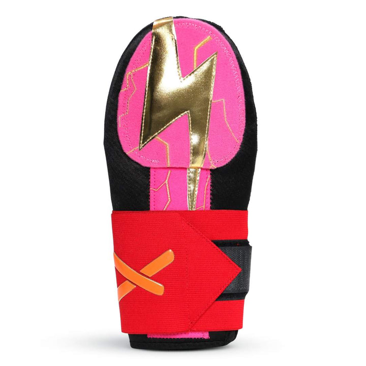A black, pink, red, and gold sliding mitt with a lightning bolt design, featuring a layer that appears to be peeled away to reveal a lighter interior.