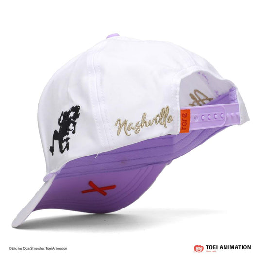 White and purple hat with embroidered designs with rare tab attached to the snapback 