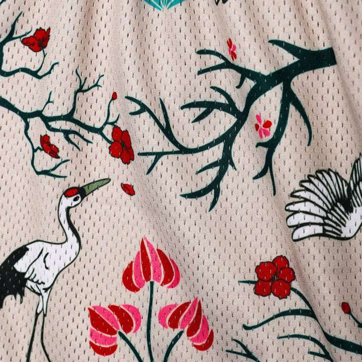 Translation missing: en.Textile with crane and floral pattern on a beige background